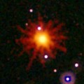 Images from Swift's Ultraviolet/Optical (white, purple) and X-ray telescopes (yellow and red) were combined in this view of GRB 110328A, which is now known as Sw 1644+57. The blast was detected only in X-rays, which were collected over a 3.4-hour period on March 28. Credit: NASA/Swift/Stefan Immler