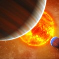 Image right: An artist's conception of the extrasolar planetary system around the star Kepler-9. Astronomers have discovered an earth-sized planet in this system. (Photo courtesy NASA, Kepler, T. Pyle)