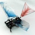 A six-legged, 25 g robot has been fitted with flapping wings in order to gain an insight into the evolution of early birds and insects. Published, 18 October, in IOP Publishing's journal Bioinspiration & Biomimetics, the study showed that although flapping wings significantly increased the speed of running robots, the origin of wings may lie in animals that dwelled in trees rather than on the ground. "A wing assisted running robot and implications for avian flight evolution" (K Peterson, P Birkmeyer, R Dudley and R S Fearing 2011 Bioinspir. Biomim. 6 046008)